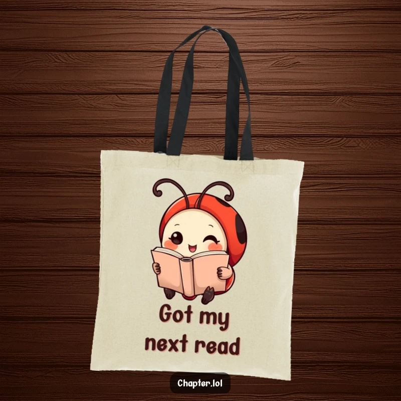 Funny Ladybug Tote Bag: Artwork of a cute ladybug with antennae curled like bookmarks, reading a tiny book.